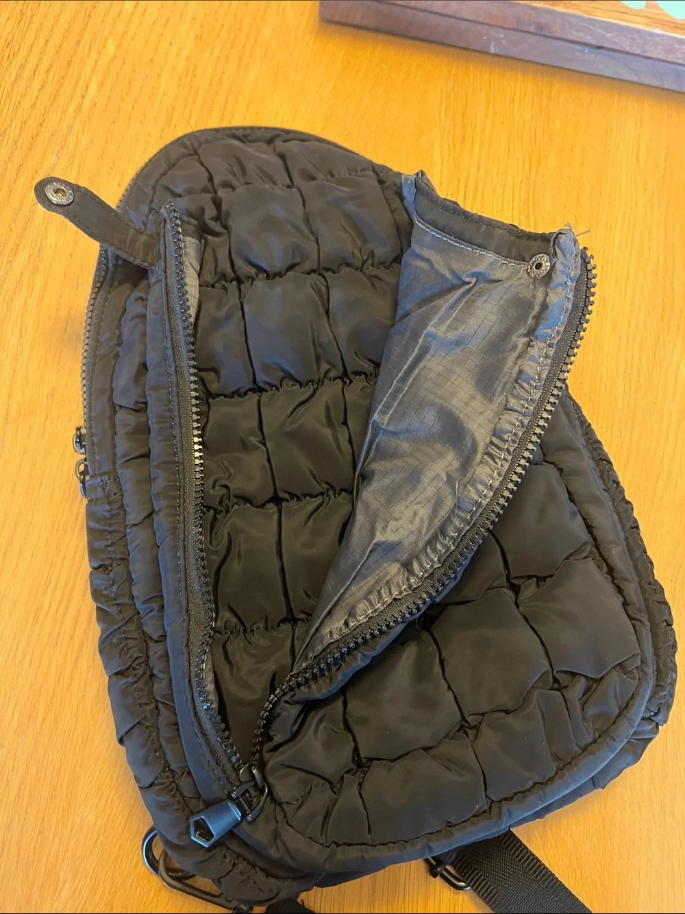 Sol and Selene crossbody pack, black, puffy, nylon, durable and super useful